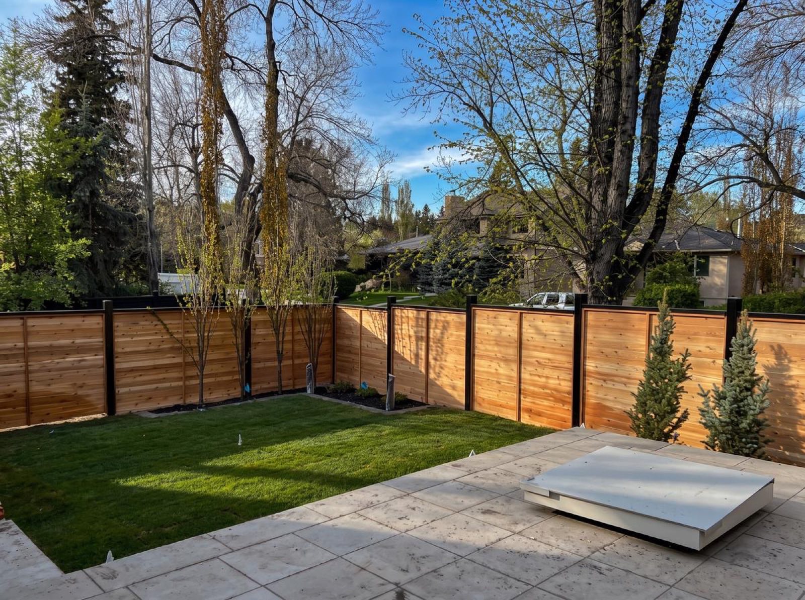 Cedar fence and paver patio